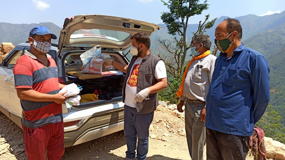Kits Unloaded on Mountain Road