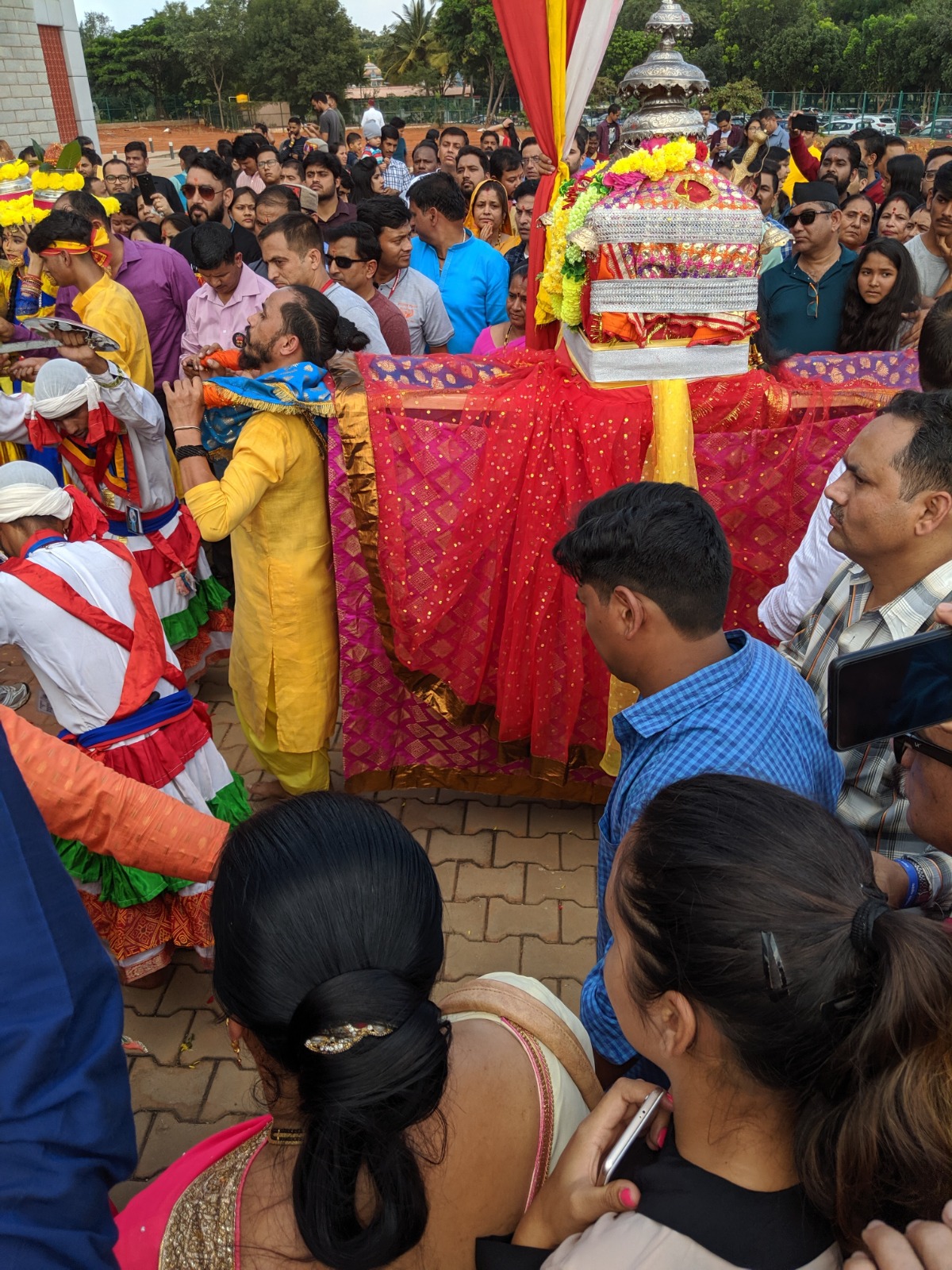 Sacred Doli Through the Crowd